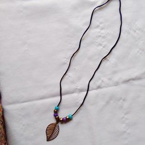 Black Corded Necklace with Beads and Goldtone Leaf